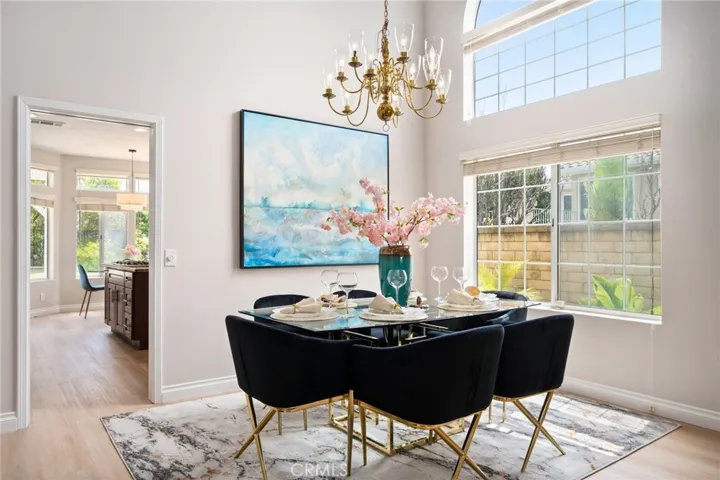 Formal Dining Room featuring soaring ceiling.