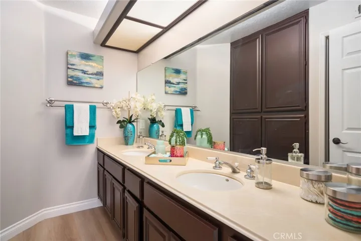 Main bath on the second level includes dual wash basins