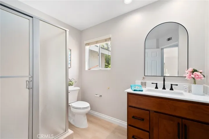 Updated full bath on main level —featuring a brand-new vanity and walk-in shower.