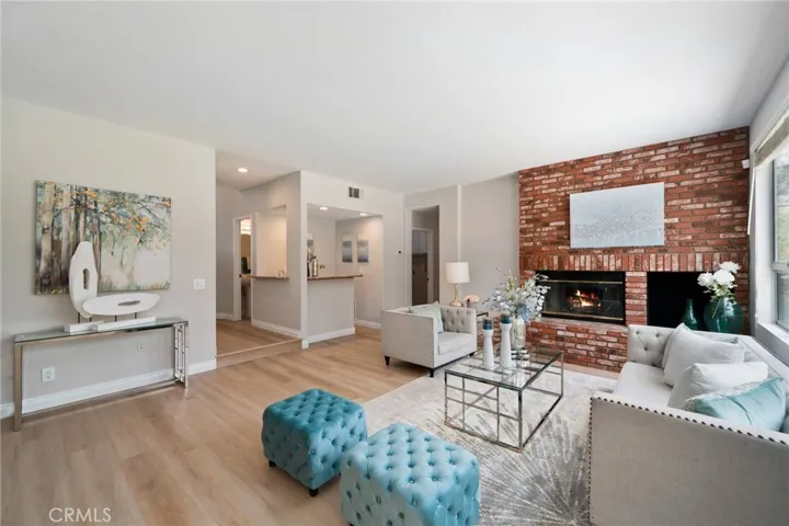 The large family room, complete with a second fireplace and wet bar.