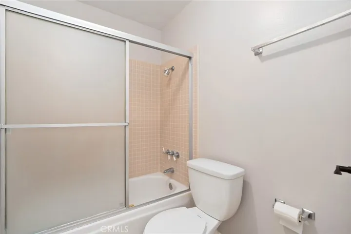 Shower and bathtub in the second level main bath.