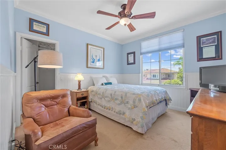 Bedroom with walk-in closet