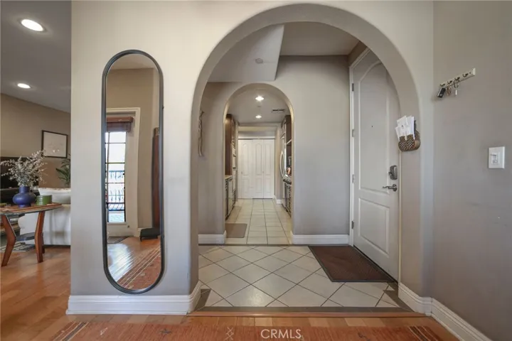 Arched doorways add to the charm of this incredible condo