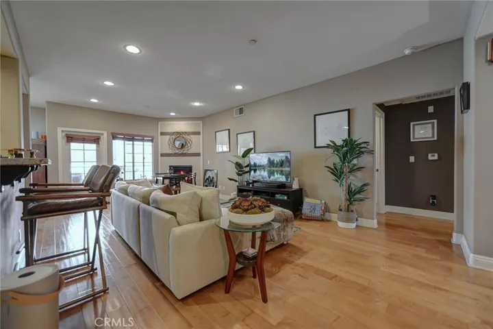 Living room opens to the kitchen via the breakfast bar