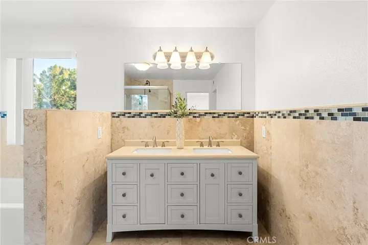 upstairs primary bathroom dual vanities