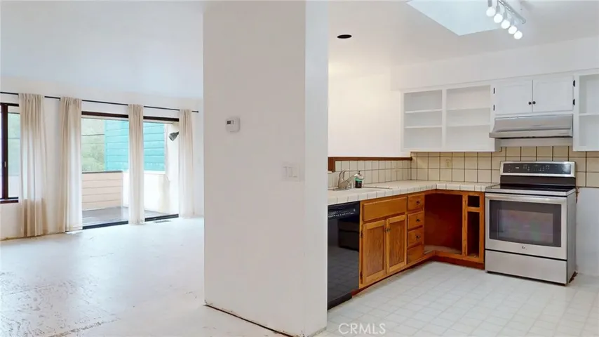 Open concept with the living and dining space and kitchen