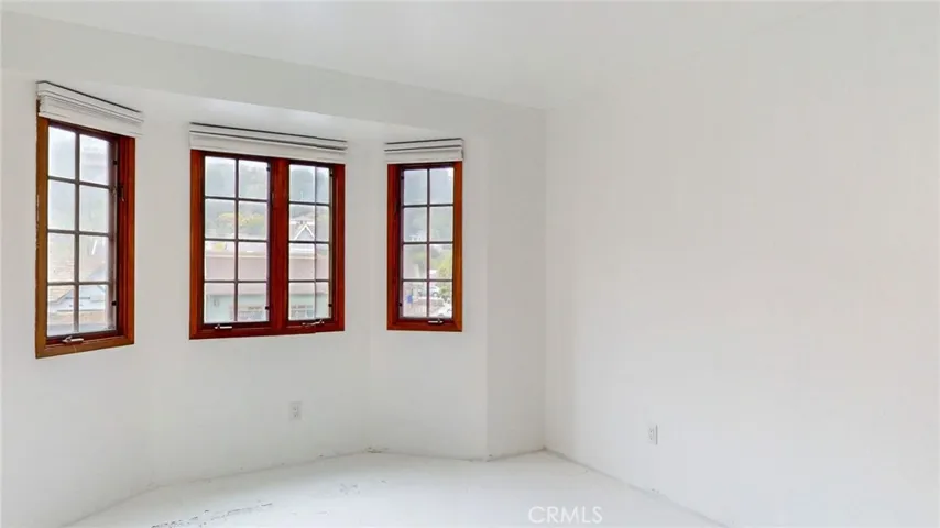 The guest bedroom overlooks Main Street