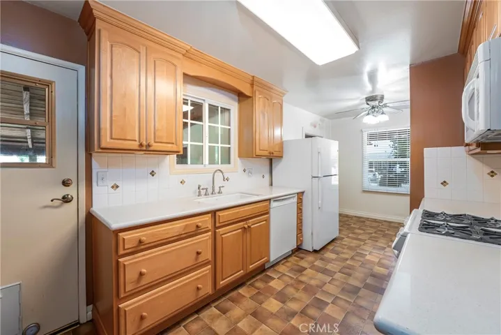 Kitchen door opens to covered patio