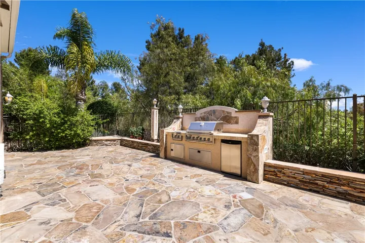 Backyard with built-in BBQ & fridge