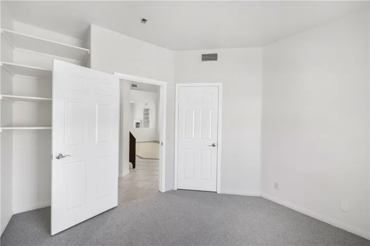 Downstairs Bedroom or Office w/ closet and built in shelves