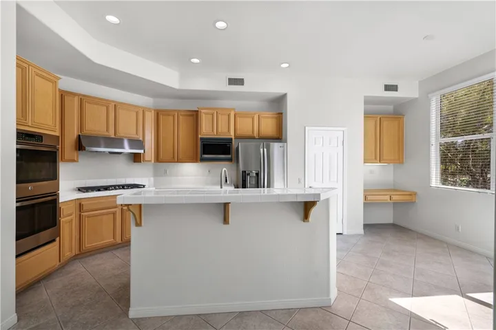 Kitchen w/Breakfast Bar. Family Dining and built-in Desk