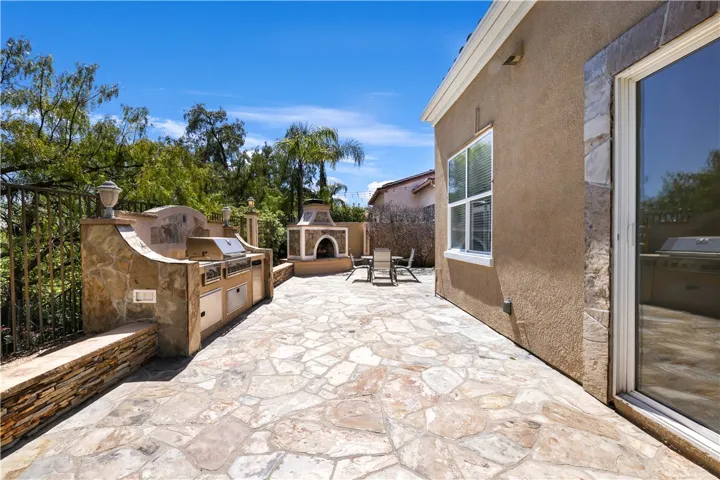 Entertainers Delight w/ built-in  bbq, and outdoor fireplace, stone patio