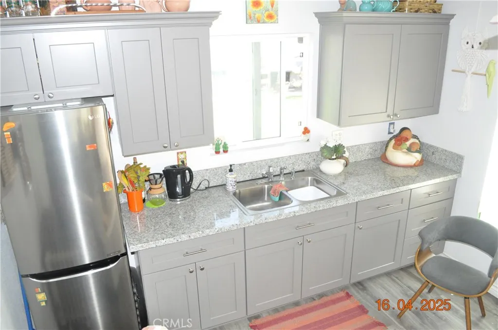 Mini Kitchenette. Sink, Plus Cabinet Space..