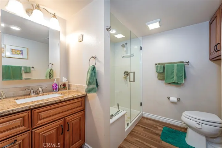 Remodeled shower with seat and grab bars