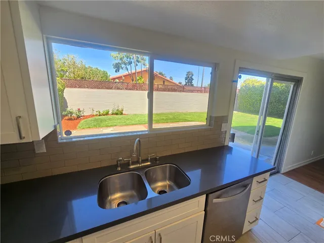 view to back yard from kitchen