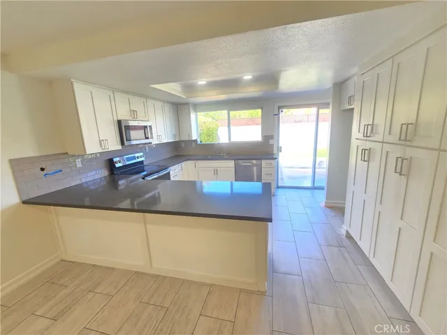 Kitchen and part of family room