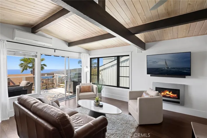 Accented by exposed beam ceilings and walls of glass, the interiors are thoughtfully designed to maximize natural light and uninterrupted views.