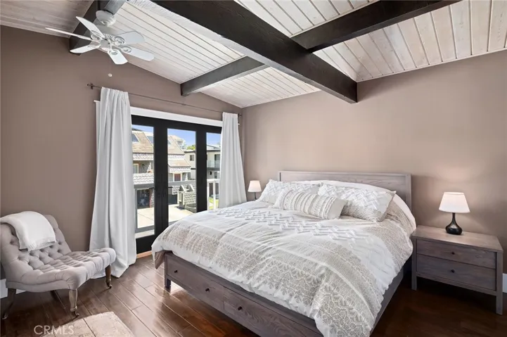 The residence comprises three bedrooms and two-and-a-half bathrooms, including a main-level primary suite complete with a spa-like ensuite and walk-in closet.