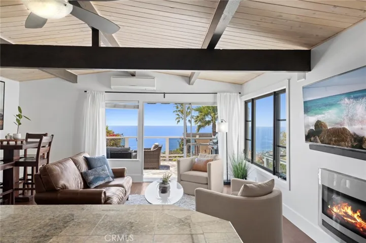 The epitome of refined coastal living, this immaculate residence offers sweeping views of the Pacific Ocean, Catalina Island, and the iconic Southern California coastline from its main living areas.