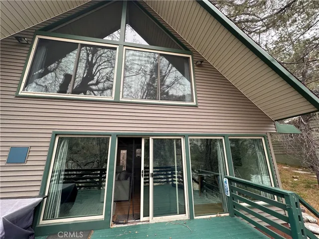 Living room deck and stair to guest suite