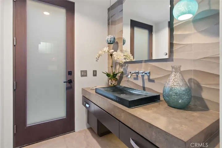 Beautifully appointed guest powder room.
