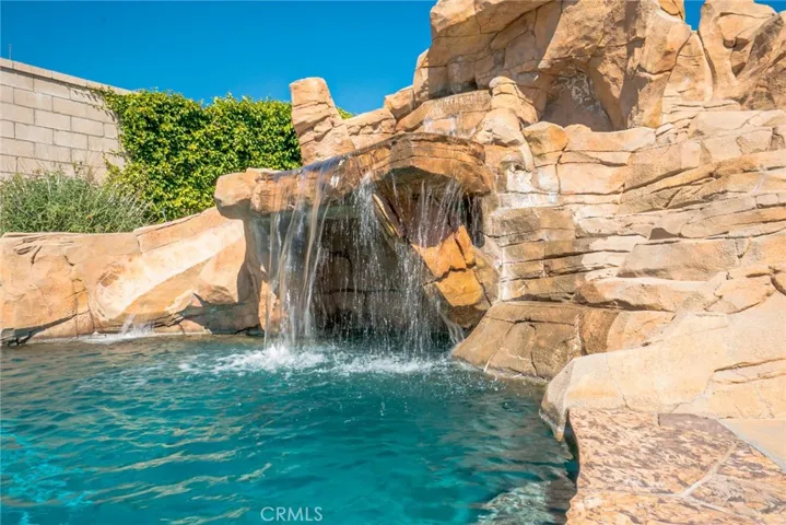 Pool with slide and waterfall