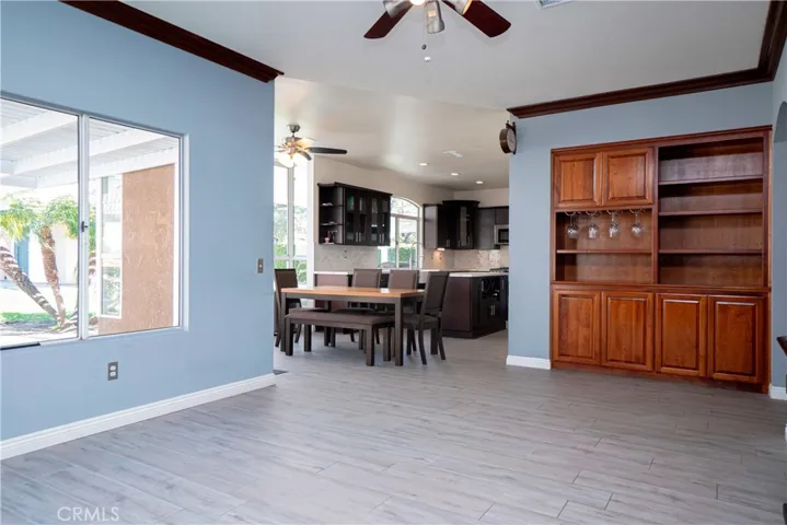 Family room looking onto breakfast nook and kitchen