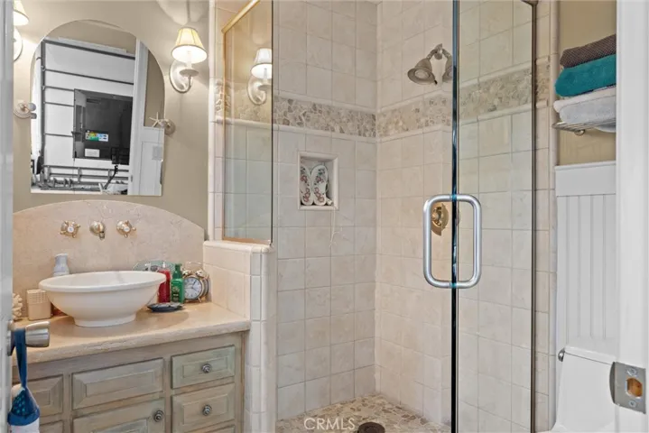 Ensuite bathroom for bedroom off kitchen.