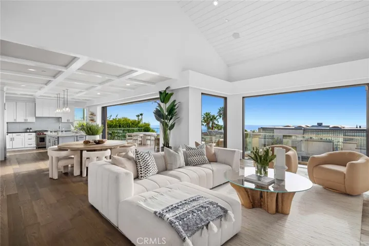 Nestled near the end of a peaceful cul-de-sac in Laguna Beach’s desirable Portafina enclave, this stunning custom home is a true oasis offering exceptional privacy and unparalleled ocean views.
