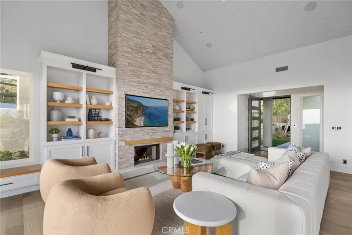 Wood flooring, coffered ceilings, designer lighting fixtures and top-tier finishes and millwork are showcased throughout.