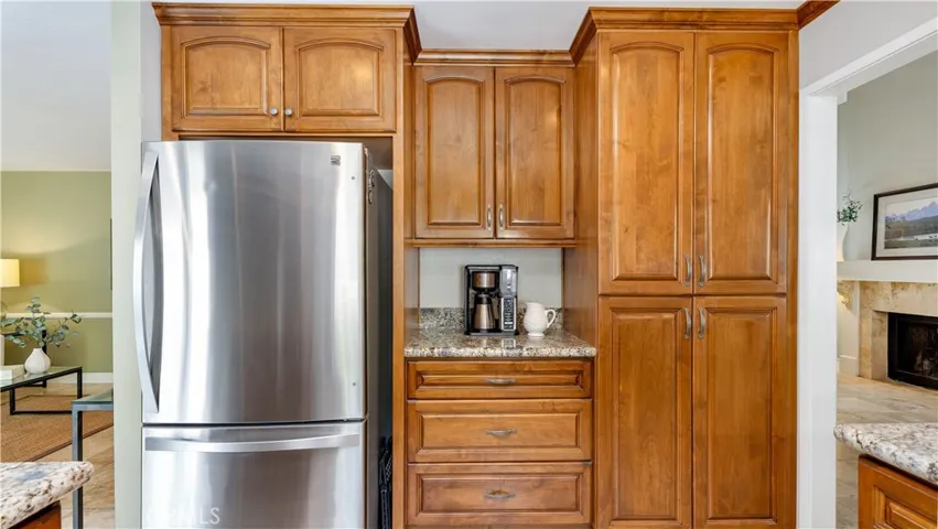 The stainless steel refrigerator with bottom freezer is included
