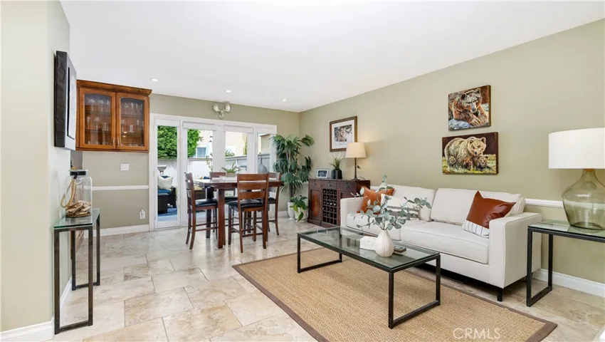 The travertine flooring is easy maintenance...open Family room, nook. kitchen