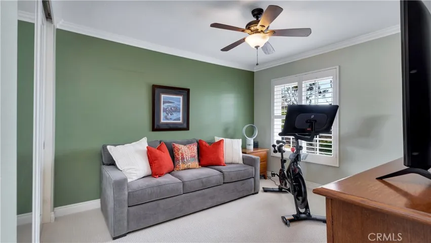 Bedroom #3-crown moldings, custom closet and ceiling fan