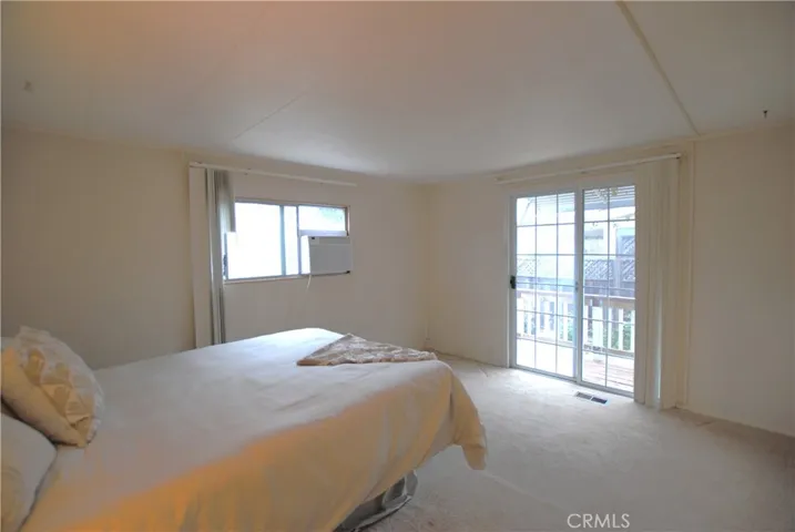 Primary suite with slider and A/C
