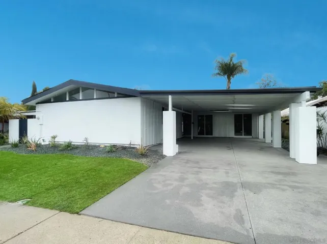 Landscaped Front with ample carport and driveway parking