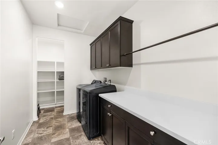 Laundry Room w/ Built in Linen Storage
