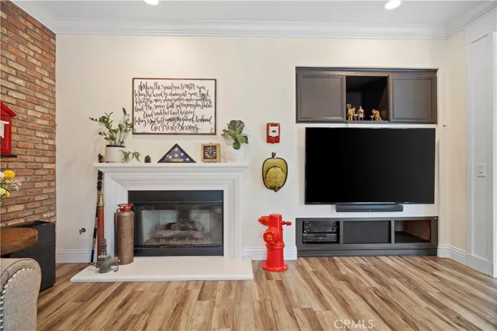 Family area with fireplace and entertainment center
