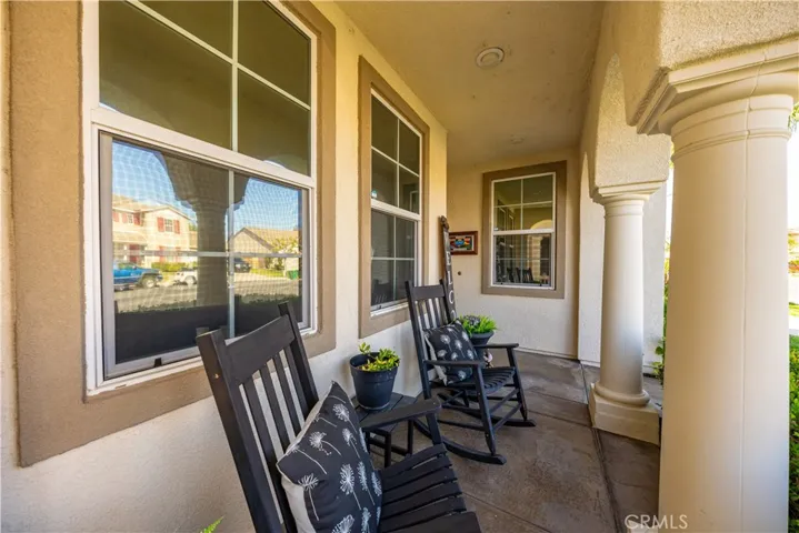 Looking from flowerbed to porch