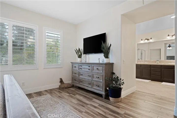 Primary bedroom looking to bathroom