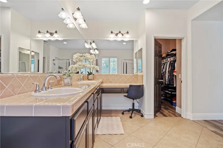 Primary Bathroom to walk in closet