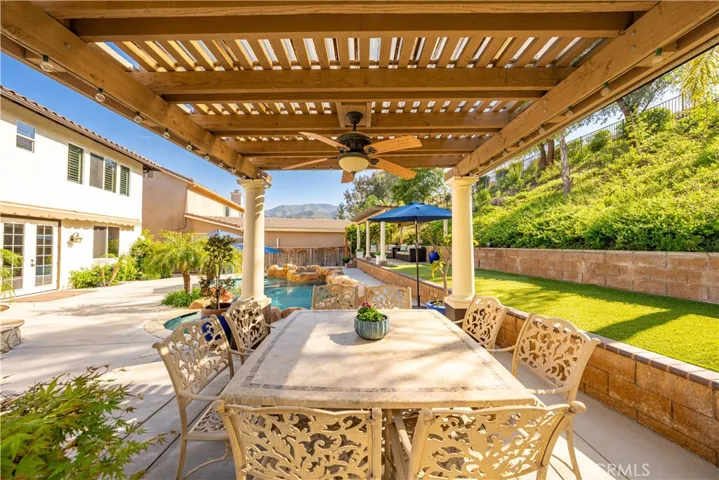 Permanent gazebo with artificial turf area