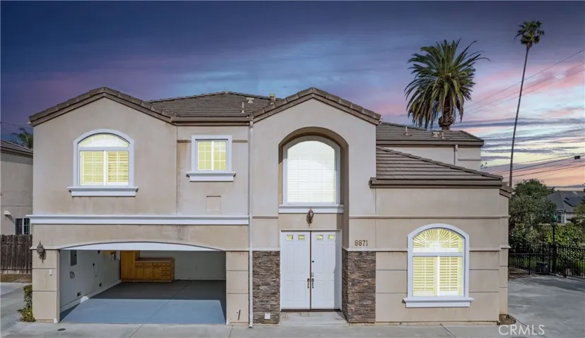 Detached front unit. 4 car parking with automatic garage door opener and new EV Charger