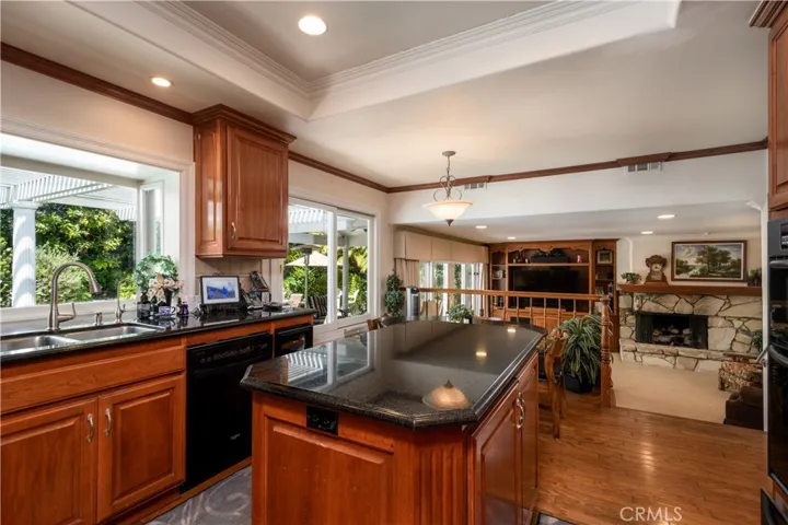 Kitchen is open to the den