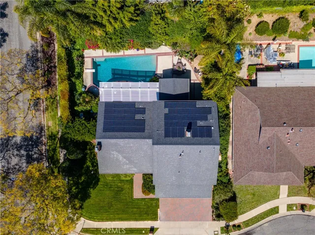 Aerial shows the verdant landscaping and large lot