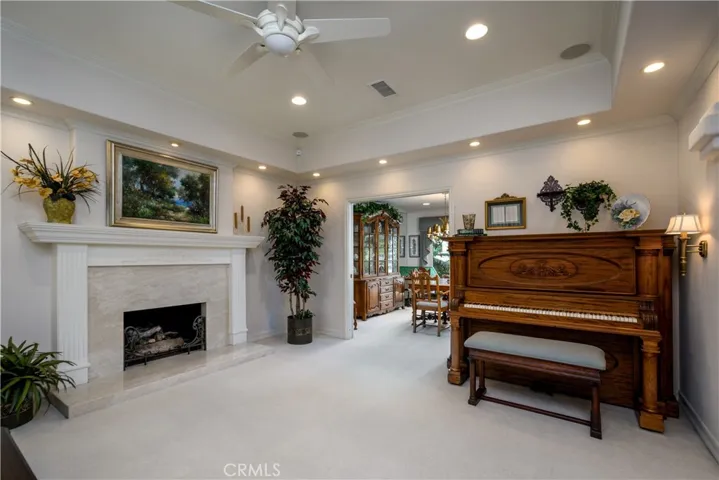 Pocket doors lead into the formal dining room