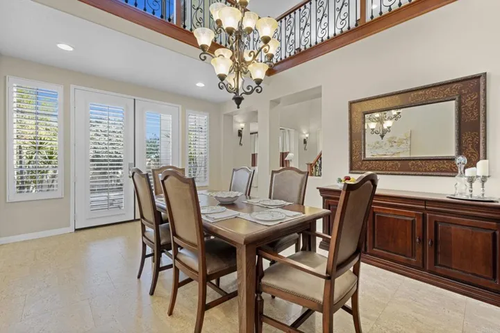 Dining Room has french doors that open to the side yard