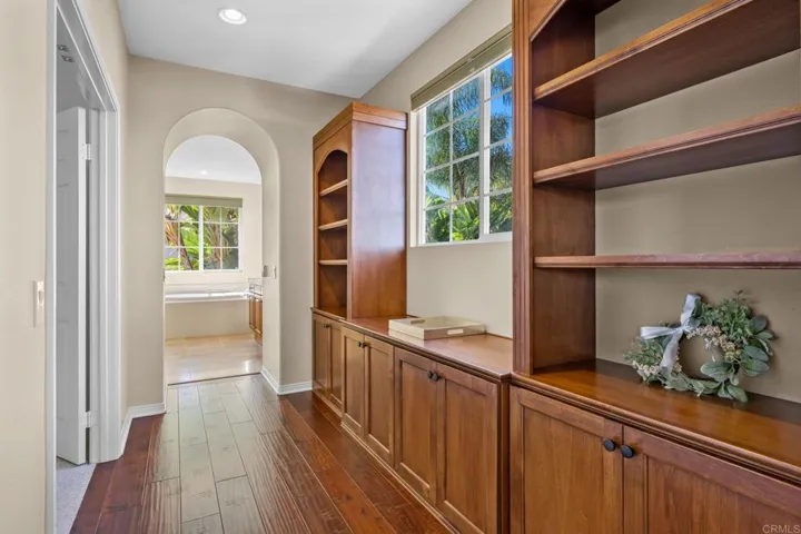 Cabinets in-between Primary Bedroom & Primary Bath