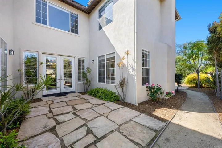 Side Yard outside Dining Room with Stone Patio... perfect for indoor-outdoor entertaining!