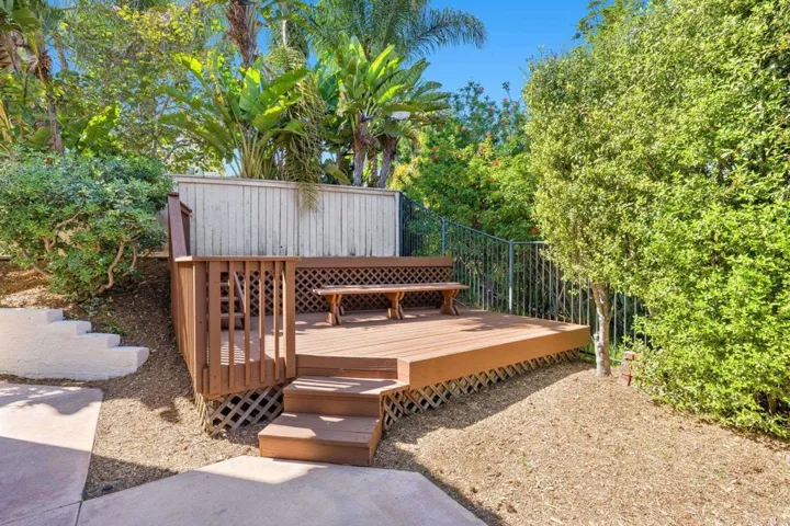 Raised wood deck in backyard