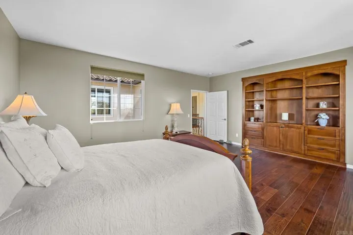 Primary Bedroom with Built-in Entertainment Center